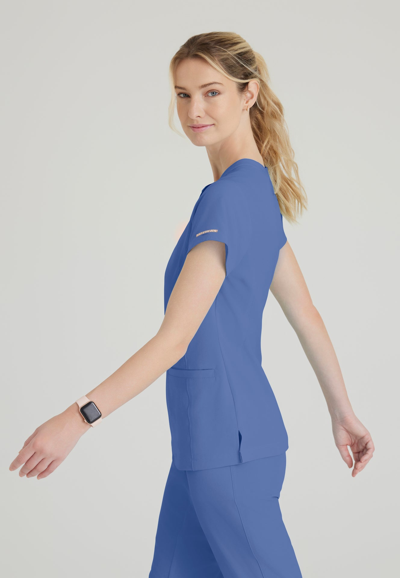 SKT259 - Skechers Women's Coast 2-Pocket Banded Collar Top