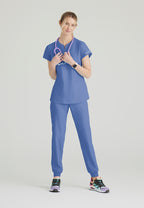 SKT259 - Skechers Women's Coast 2-Pocket Banded Collar Top