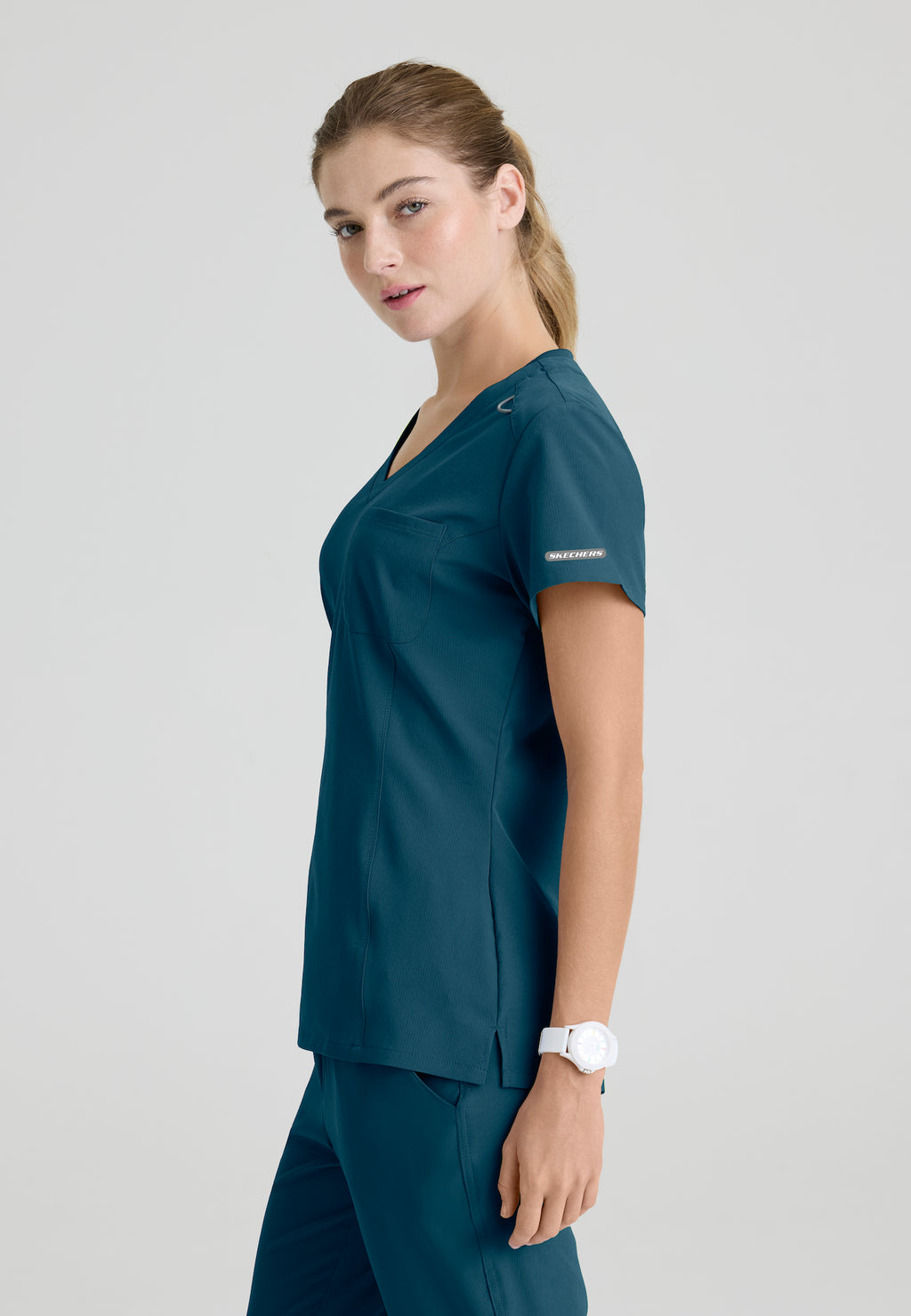 SKT147 - Skechers Women's Single Pocket V-Neck Tuck In Top