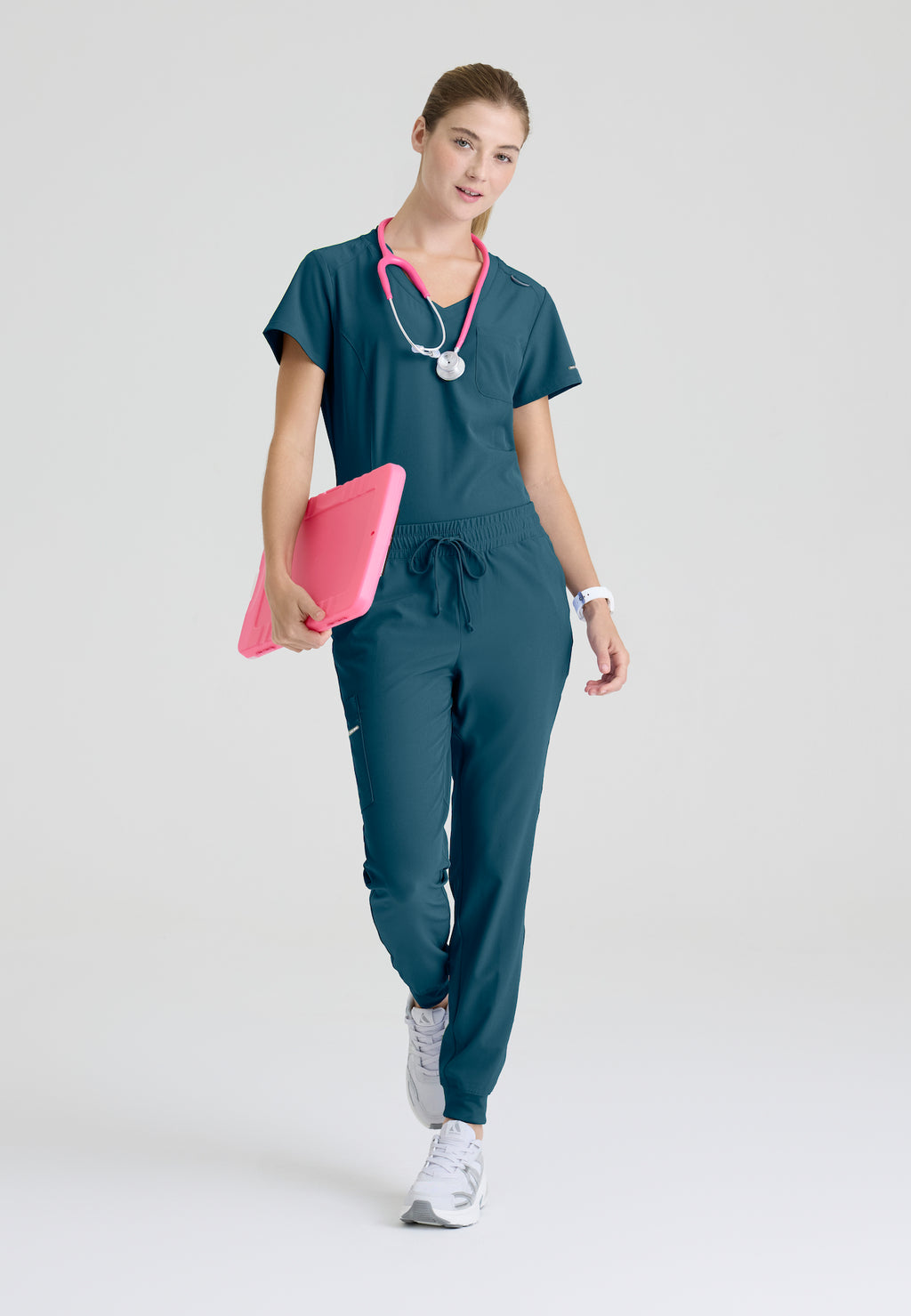 SKT147 - Skechers Women's Single Pocket V-Neck Tuck In Top